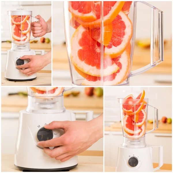 Grapefruit witte blender op een houten tafel. — Stockfoto