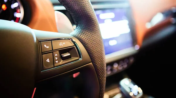 Close up steering wheel with multi function button. Luxury car interior — Fotografia de Stock