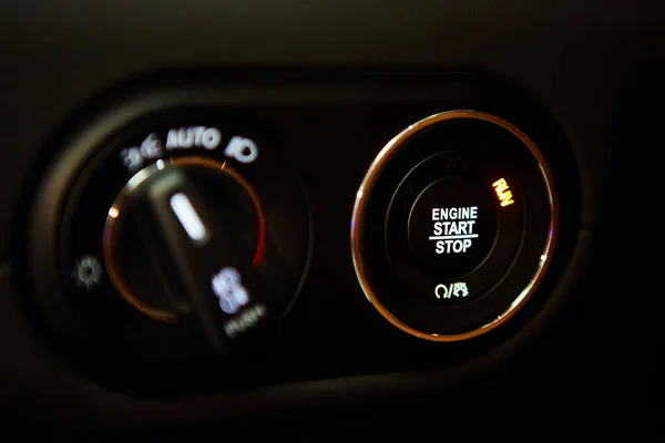 Start stop engine modern new car button. Luxury cr interior. Shallow dof. —  Fotos de Stock