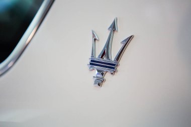 Ukraine, Kyiv - October 10, 2021: Close up logo Maserati. Presentation of new models Maserati