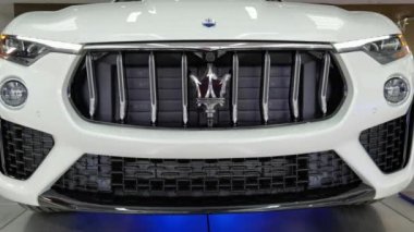 Ukraine, Kyiv - October 10, 2021: Close up logo Maserati. Presentation of new models Maserati.
