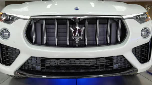 Ukraine, Kyiv - October 10, 2021: Close up logo Maserati. Presentation of new models Maserati. — Stock video