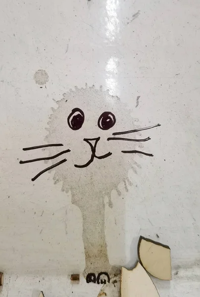 Childrens drawing of a cat from blot.