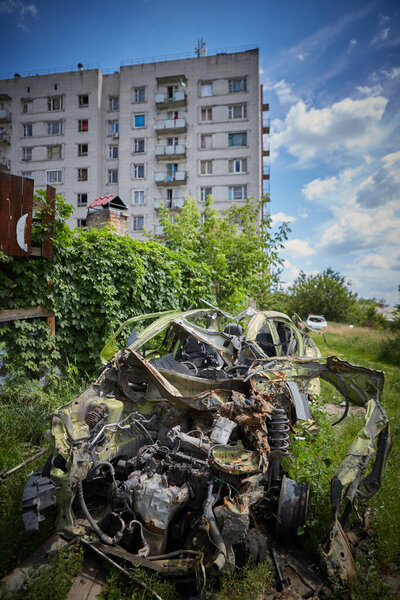 Chernihiv, Ukraine - June 26, 2022: Destroyed car on the street of the city as a result of the attack of Russian invaders
