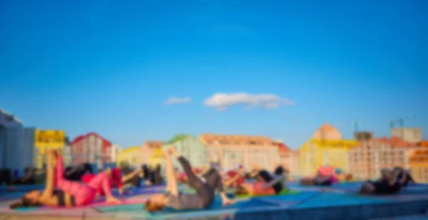 Blurred Background Peoples Playing Yoga — ストック写真