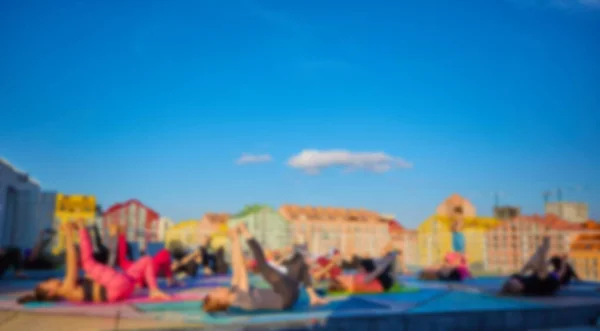 Blurred Background Peoples Playing Yoga — ストック写真