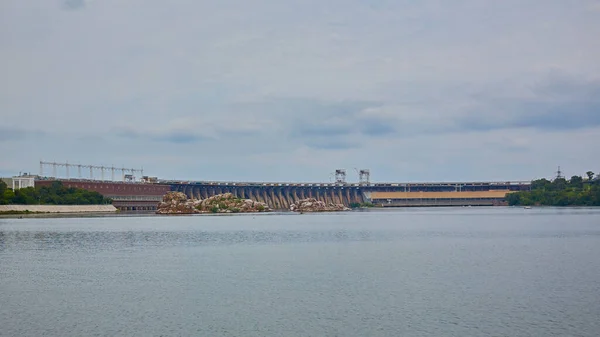 View of DneproGES in Zaporozhye. Hydroelectric power station on the Dnipro River in Ukraine. Power generation.