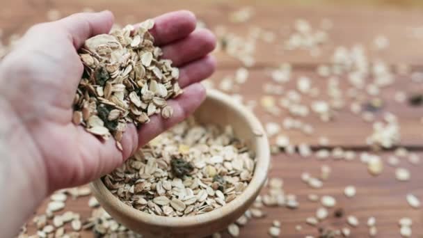 Hand Sprinkling Muesli Cereals Bowl Healthy Vegetarian Fitness Diet Food — Stockvideo