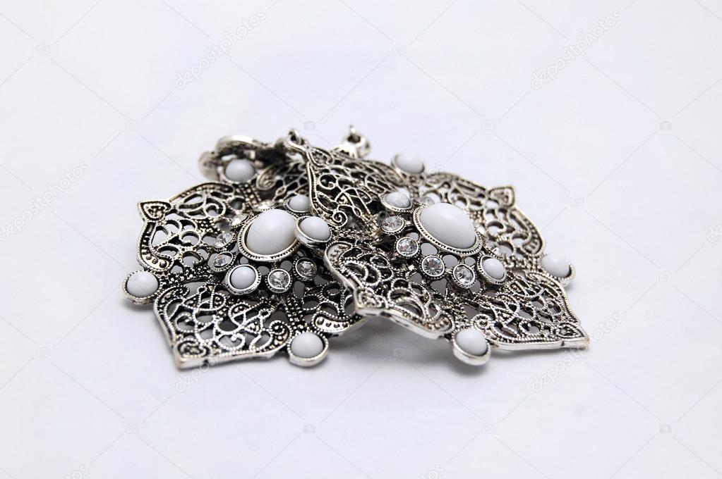 Silver earings with white stones