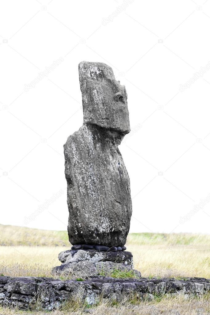 Lone standing moai in Easter Island against light background