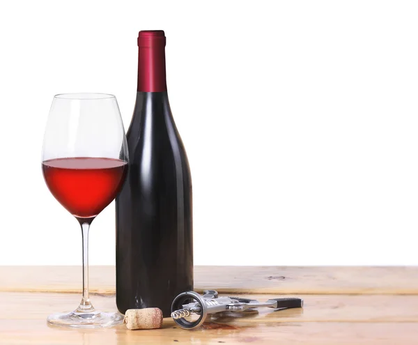 Garrafa de vinho tinto, um copo — Fotografia de Stock