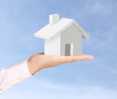 ev sahipliği temsil eden holding evi