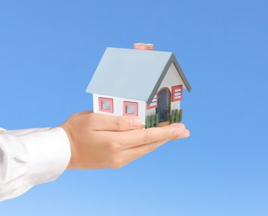 ev sahipliği temsil eden holding evi