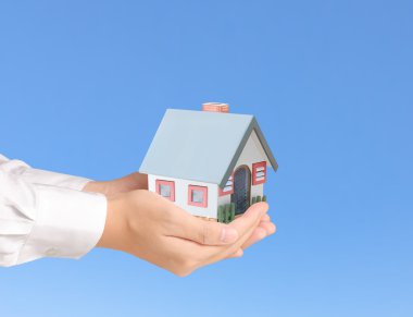 ev sahipliği temsil eden holding evi