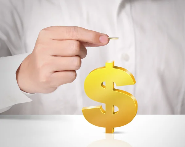 Man's hand holding Golden dollar — Stock Photo, Image