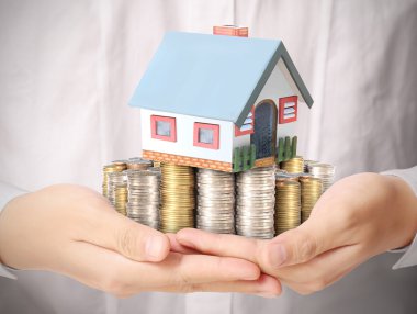 ev sahipliği temsil eden holding evi