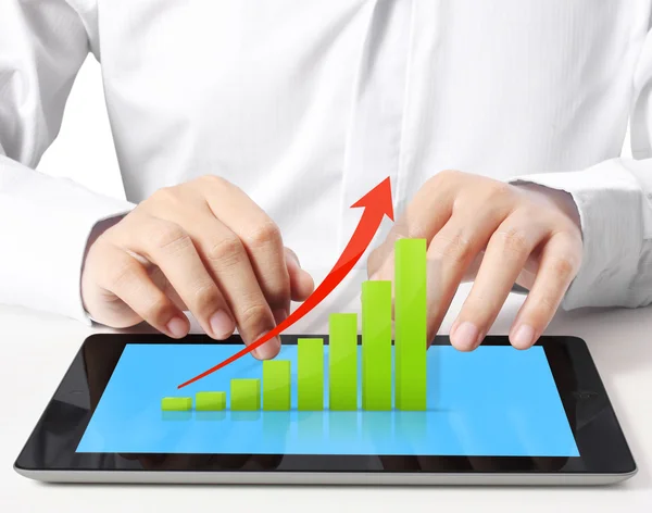 Holding touch screen tablet with graph — Stock Photo, Image