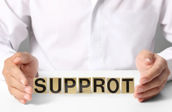 Holding word supprot — Stock Photo, Image