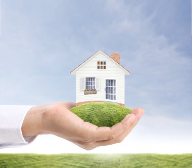 ev sahipliği temsil eden holding evi