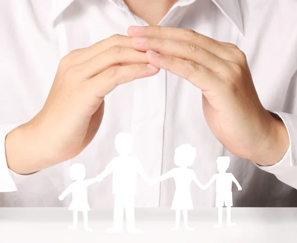 Paper family in the hand — Stock Photo, Image