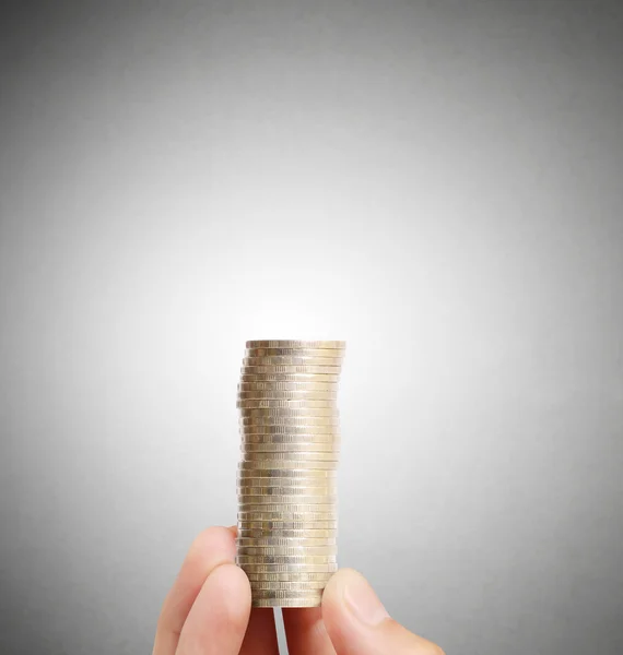 Businessman holding of  coins — Stock Photo, Image