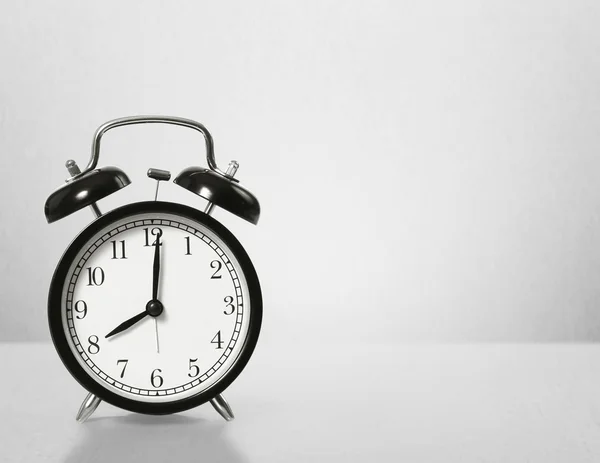 Black alarm clock — Stock Photo, Image