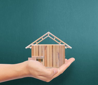 ev sahipliği temsil eden holding evi 