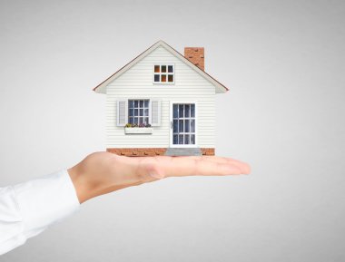 ev sahipliği temsil eden holding evi 