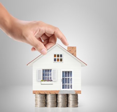 ev sahipliği temsil eden holding evi 