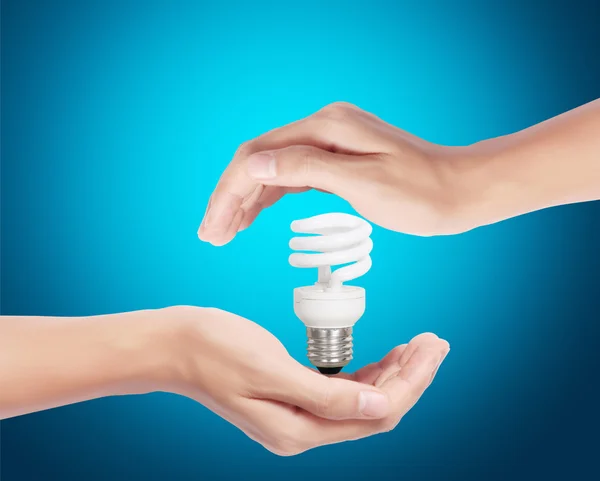 Light bulb in the hand — Stock Photo, Image