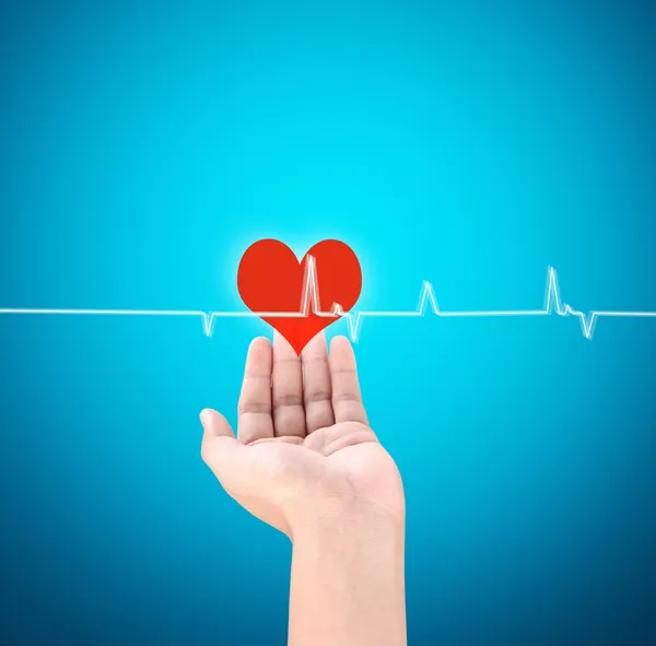 Medicine doctor working pushing heart — Stock Photo, Image