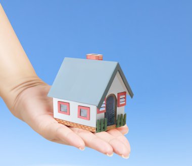 ev sahipliği temsil eden holding evi 