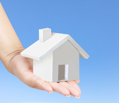 ev sahipliği temsil eden holding evi 