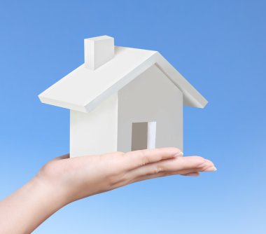 ev sahipliği temsil eden holding evi 