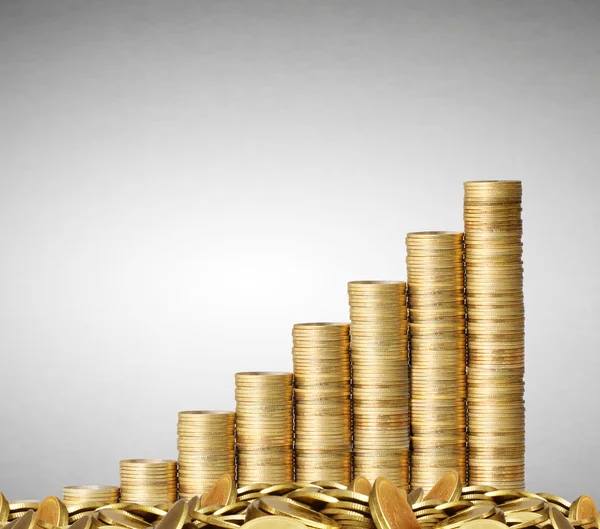 Ouro as moedas e gráfico-los — Fotografia de Stock