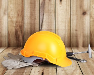 Sarı işçisi ve eski deri eldiven 