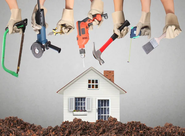 Selection of tools in the shape of a house — Stock Photo, Image