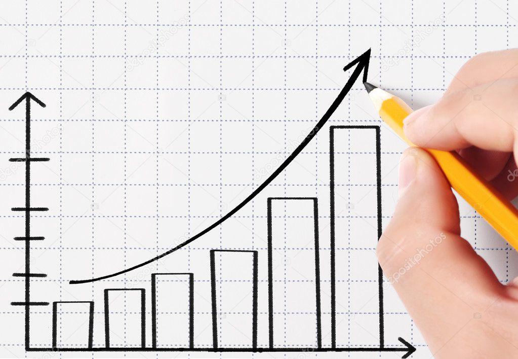 Business man drawing graph 