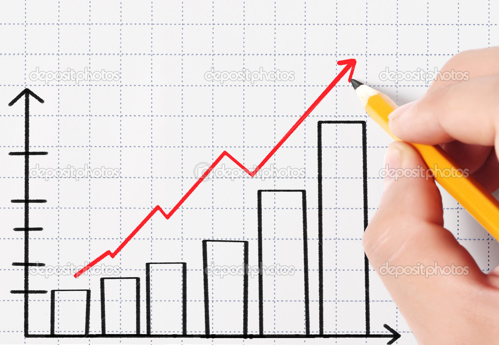 Business man drawing graph 