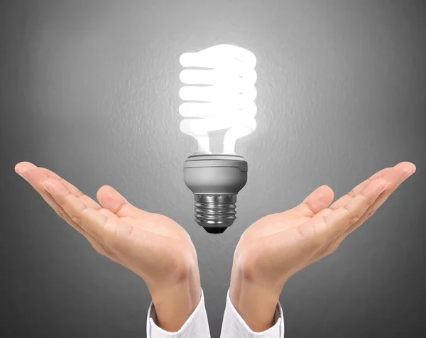 Ideas bulb light on  hand — Stock Photo, Image
