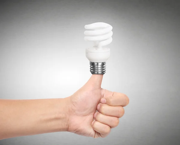 Идеи лампы накаливания на руку — стоковое фото