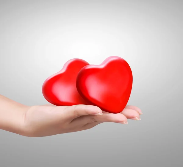 Red heart at the woman hand — Stock Photo, Image