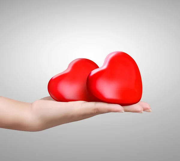 Red heart at the woman hand — Stock Photo, Image