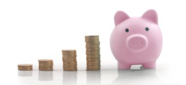 Ticari grafikli sikke, finansal yatırım konsepti ve bir Piggy Bank