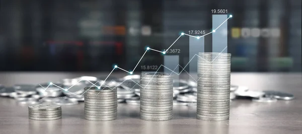 取引グラフ 金融投資の概念とコインのスタック — ストック写真