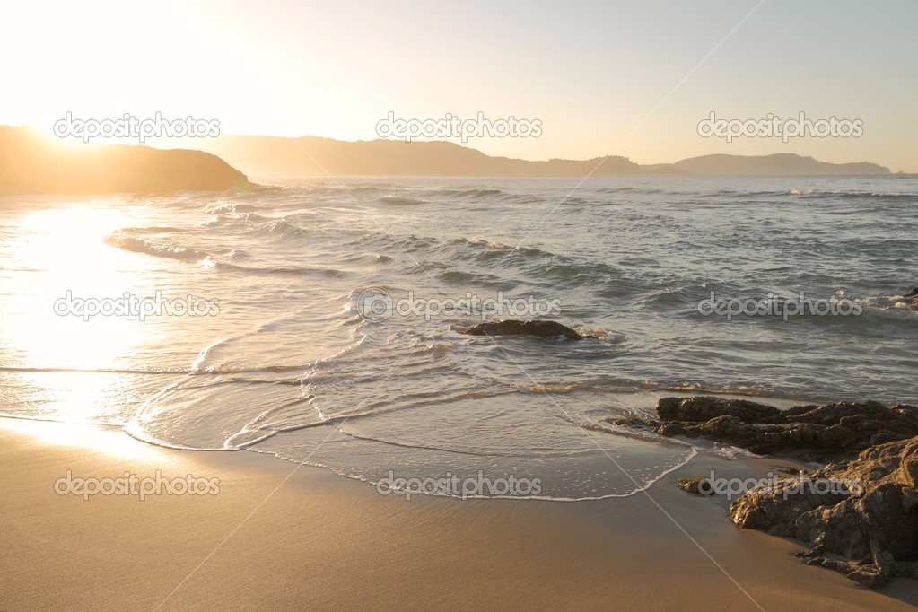 Waves washing onto Corsican beach