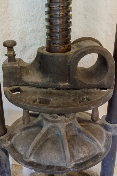 An old olive press from a mill in northern Corsica — Stock Photo, Image