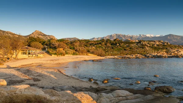 Sun setting on the beach at Arinella Plage in Corsica — Stock Photo, Image