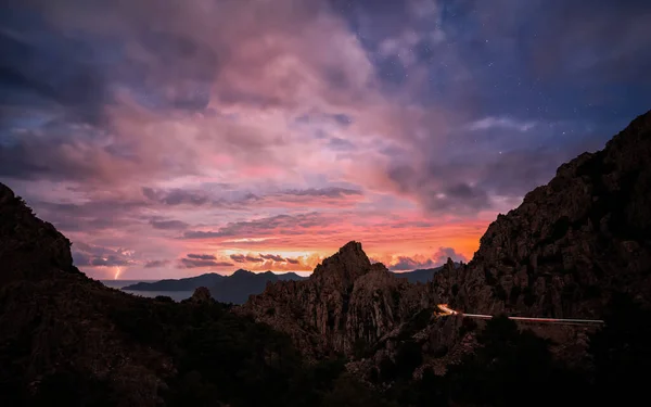 Sunrise Calanches Piana Corsica Lightning Distance Car Lights Passing D81 — Stock Photo, Image