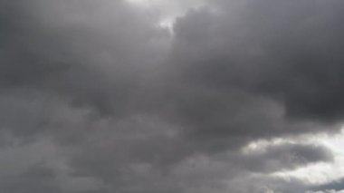 8K Sky covered with gray and depressing gloomy storm clouds.Cloudiest cloudy air weather dark approaching storm thick overcast mix mixed time lapse time lapse coming background landscape view nature.